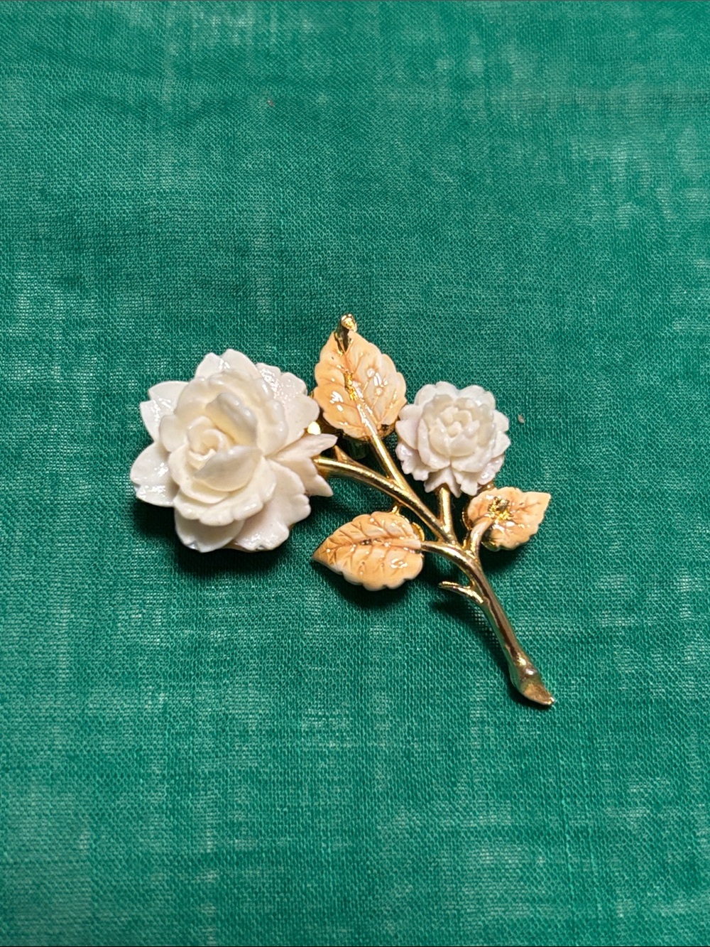 Vintage carved rose brooch